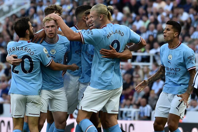 Bernardo Silva, left, celebrates with teammates. AP