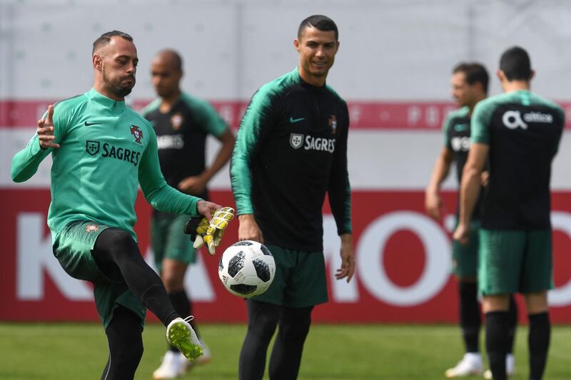Portugal's goalkeeper Beto Pimparel, right, attends a training session at their base camp in Kratovo, Moscow, Russia, on June 12, 2018. Francisco Leong / AFP