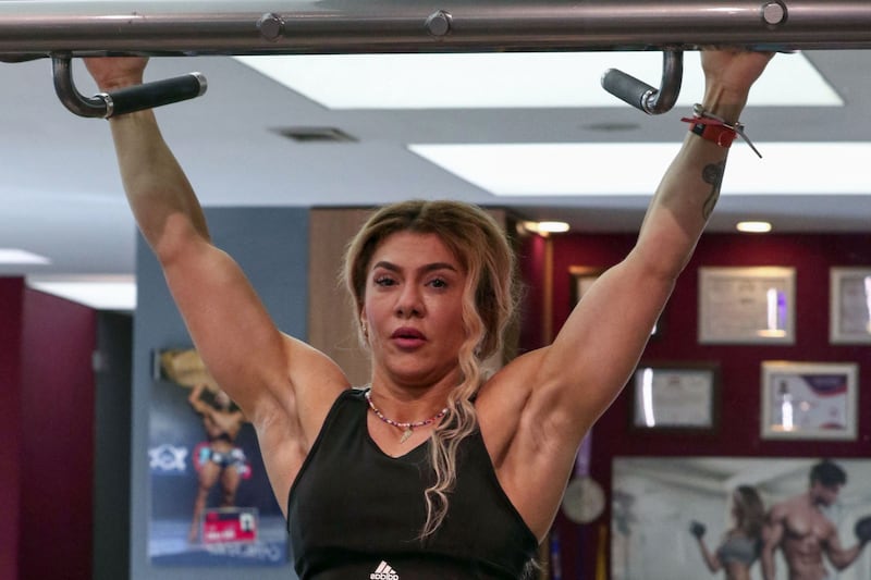 "Having muscles is good for women too," she says during a session at a gym in Erbil, where she spends four hours training every day. "We can express our beauty through bodybuilding."