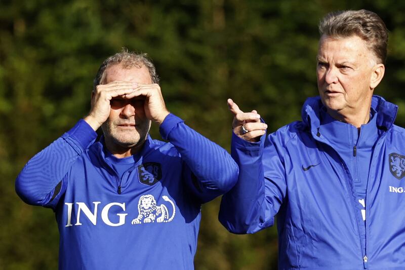 Danny Blind and Louis van Gaal. AFP