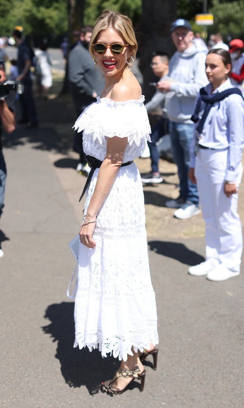 Actress Sienna Miller in a white linen Ralph Lauren dress. PA Wire 