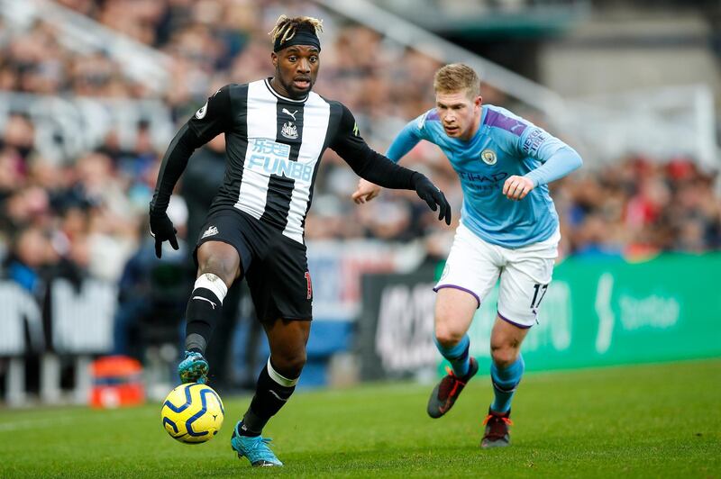 Newcastle's Allan Saint-Maximin (L) and Manchester City's Kevin De Bruyne (R) in action. AFP