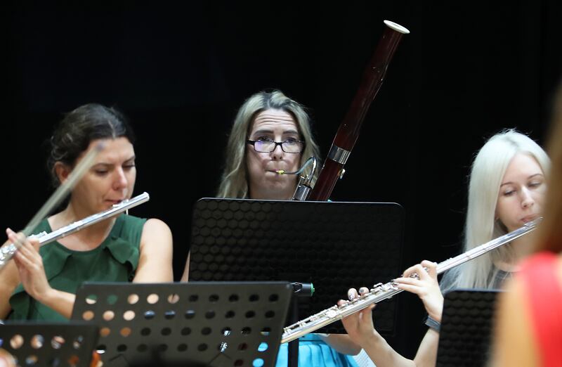 Jo Cathrine (C) playing bassoon.