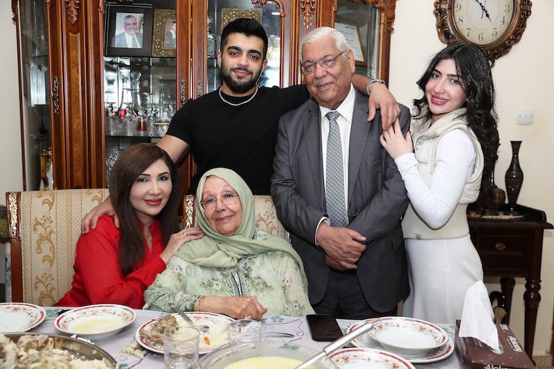 Saeed Nouri Al Tareefi with his wife Nahla Abu Dheis and their family at  their home in Ajman. All photos: Pawan Singh / The National