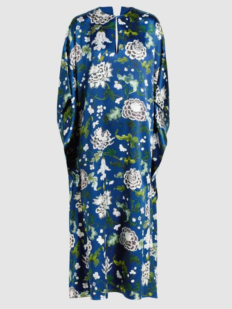 Blue by day: floral-print silk-satin kaftan gown by Adam Lippes; Dh4,960. Courtesy The Modist