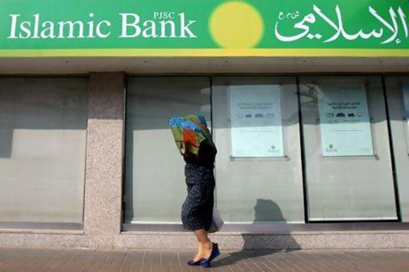 Dubai Islamic Bank reported net profits of Dh301.7 million for the first quarter, representing a 17 per cent increase compared with the same quarter last year. Karim Sahib / AFP