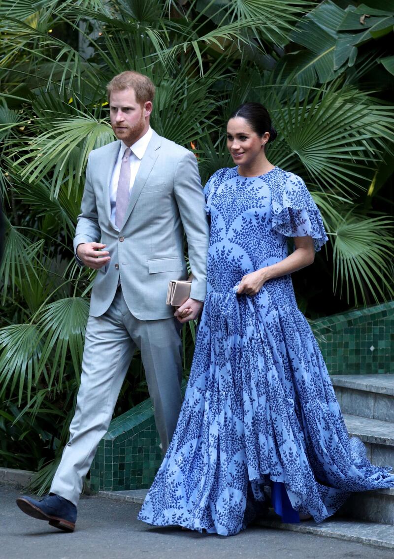 Prince Harry and Meghan, Duchess of Sussex, in Carolina Herrera, leave the residence of Mohammed VI of Morocco on February 25, 2019. AP