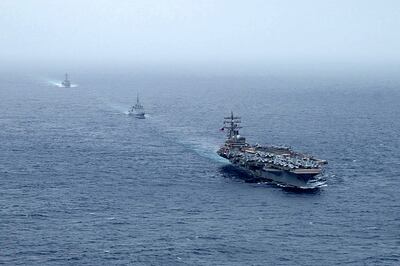 Aircraft carrier 'USS Ronald Reagan', French Navy frigate 'FS Languedoc' and 'USS Halsey' in formation in the Arabian Sea. AFP