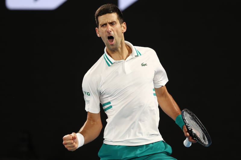 2021: Djokovic celebrates a 7–5, 6–2, 6–2 victory against Daniil Medvedev to win his ninth Australian Open.