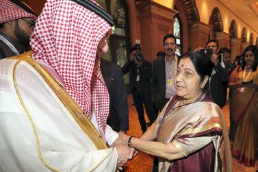 Indian Foreign Minister Sushma Swaraj speaks to Adel Al Jubeir, Saudi Arabian Foreign Minister at an OIC ministerial meeting in Abu Dhabi. Chris Whiteoak / The National