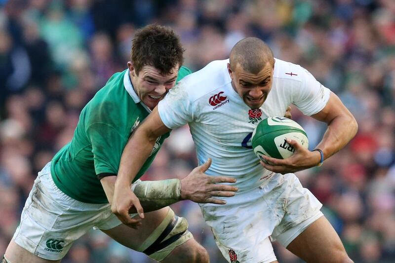 Jonathan Joseph of England is tackled by Peter O’Mahoney of Ireland. Alex Livesey / Getty Images