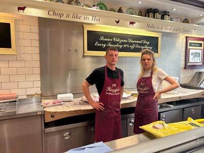 Danny and his colleague Charlotte pose in Reggie's Butchers in Uxbridge town centre. Laura O'Callaghan / The National