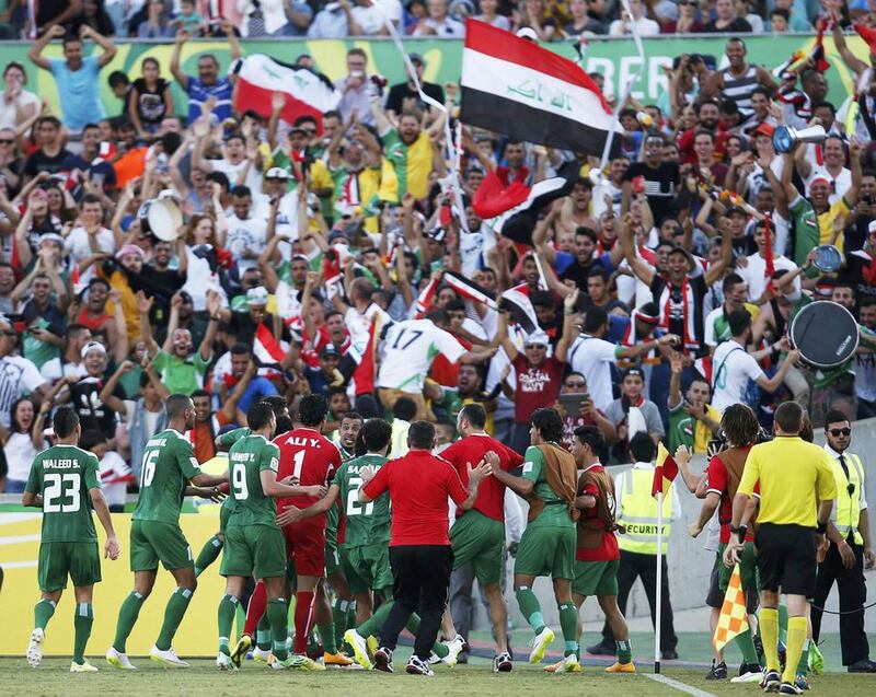 Iraq, led by Younis Mahmoud, have defied great odds back home to enter the semi-finals of the Asian Cup. Tim Wimborne / Reuters