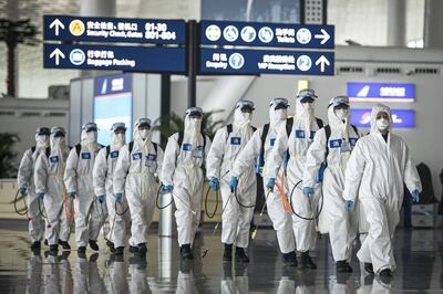 WUHAN, CHINA - APRIL 03: ï¼ˆCHINA OUTï¼‰Firefighters prepare to conduct disinfection at the Wuhan Tianhe International Airport on April 3, 2020 in Wuhan, Hubei Province, China. Wuhan, the Chinese city hardest hit by the novel coronavirus outbreak, conducted a disinfection on the local airport as operations will soon resume on April 8 when the city lifts its travel restrictions. (Photo by Getty Images)