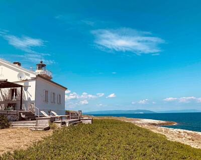 A beachfront lighthouse in Croatia's Medulin. Photo: Airbnb
