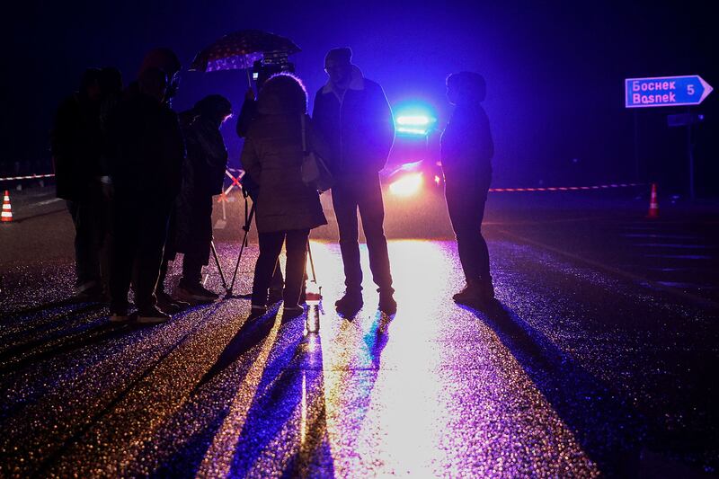 Members of the media wait for more information to be released by police. Reuters