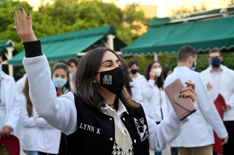 Medical students at the American University of Beirut (AUB) shout slogans during a protest against the adjustment of the dollar rate for new tuition fees in Beirut, Lebanon. EPA