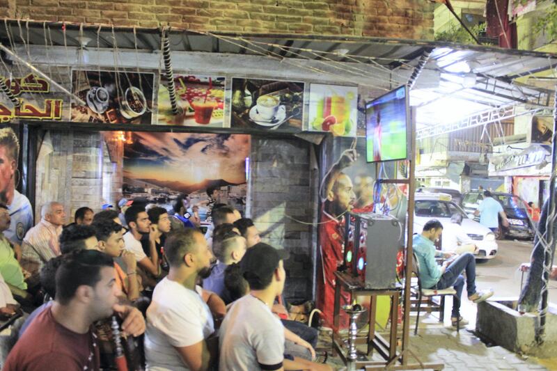 Liverpool fans celebrate in Cairo. Adham Youssef