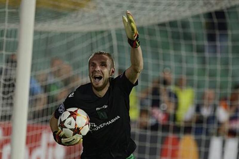 Cosmin Moti, Ludogorets Razgrad’s goalkeeper, celebrates their victory over Steaua Bucharest after penalties in their Uefa Champions League play-off second-leg match in Sofia, Bulgaria. Vassil Donev / EPA