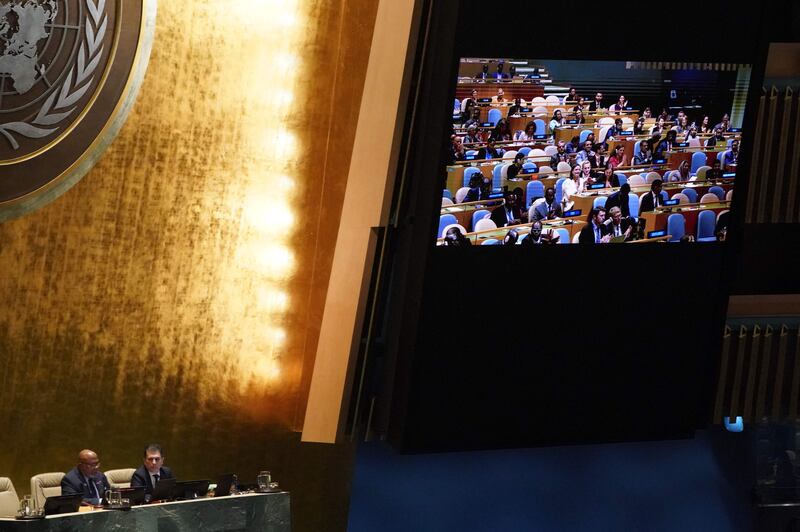 UN General Assembly President Dennis Francis, lower left, reads the results of the Human Rights Council elections in New York. AFP