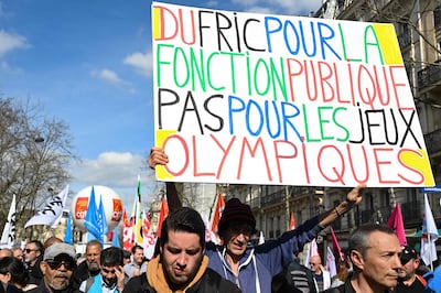 French public-sector workers on a recent demonstration asking for more pay during the Olympic Games. AFP