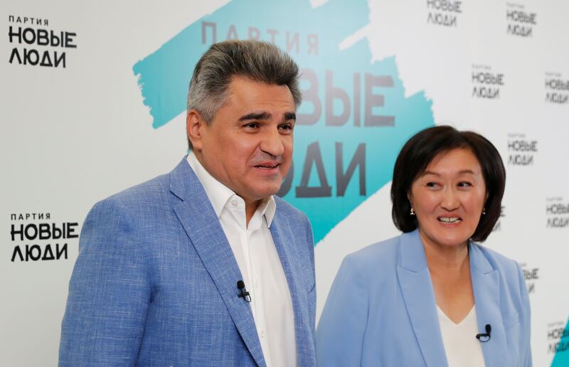 Alexey Nechayev, leader of the New People political party, and his adviser Sardana Avksentieva attend a news conference at the party's headquarters in Moscow. Reuters