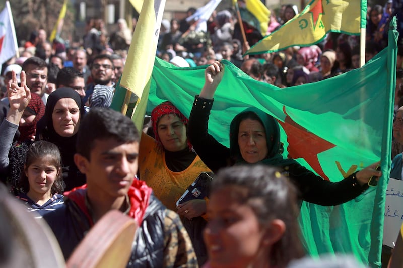 Syrian Kurds take part in a protest in the northeastern city of Qamishli. Delil souleiman / AFP Photo