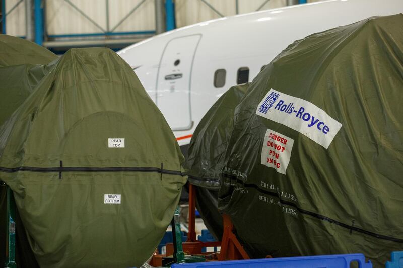 Jet engines, manufactured by Rolls-Royce Holdings Plc, sit under covers in the Diamond Hanger at London Stansted Airport in Stansted, U.K., on Thursday, July 9, 2020. With jet fares running about 20% lower than average thanks to sharp dips in business travel demand and a host of other factors, switching from first class to private has become a more reasonable investment in health and safety. Photographer: Luke MacGregor/Bloomberg