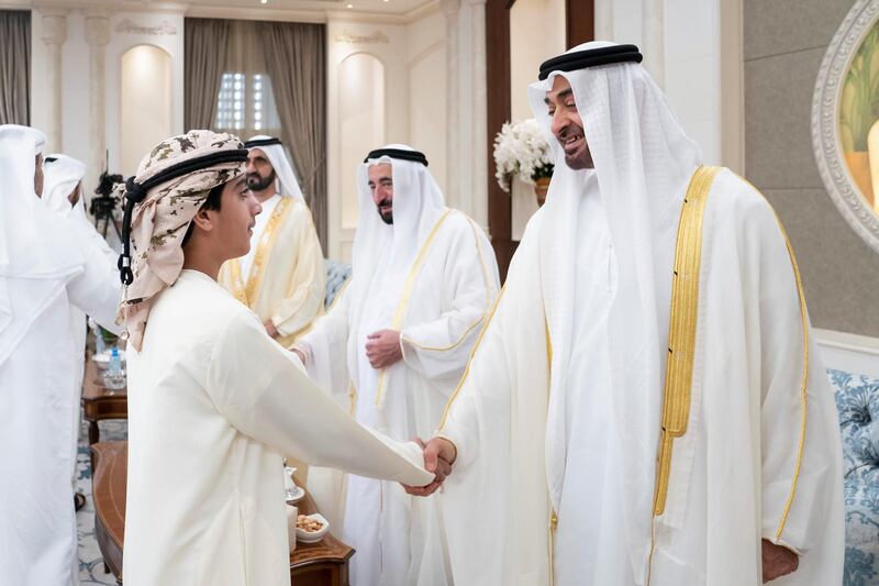 ABU DHABI, UNITED ARAB EMIRATES - June 04, 2019:  HH Sheikh Mohamed bin Zayed Al Nahyan, Crown Prince of Abu Dhabi and Deputy Supreme Commander of the UAE Armed Forces (R), greets a guest during an Eid Al Fitr reception, at Mushrif Palace.

( Eissa Al Hammadi for Ministry of Presidential Affairs )
---