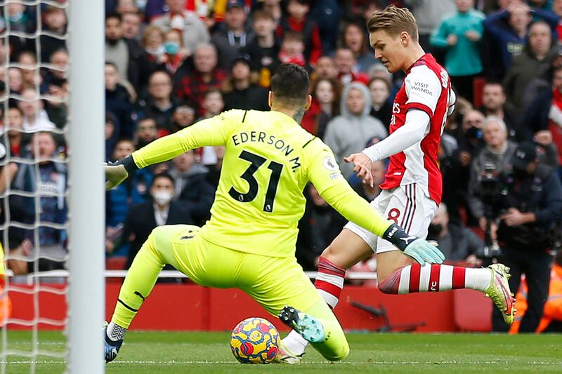 Martin Odegaard - 7: Claimed he should have had penalty after Ederson challenge but referee and VAR felt keeper had won ball. Key player in superb Arsenal first half performance but was sacrificed for defender after Gabriel red card. AFP