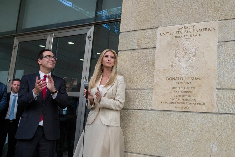 U.S President Donald Trump's daughter Ivanka, right, and US Treasury Secretary Steve Mnuchin during the opening ceremony of the new US embassy in Jerusalem, Monday, May 14, 2018. Amid deadly clashes along the Israeli-Palestinian border, President Donald Trump's top aides and supporters on Monday celebrated the opening of the new U.S. Embassy in Jerusalem as a campaign promised fulfilled. (Flash90 Photo/Yonatan Sindel via AP) ISRAEL OUT