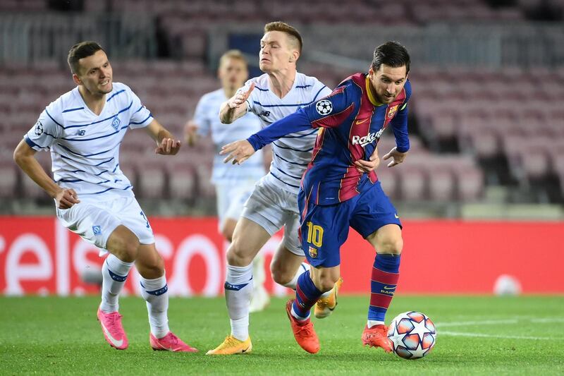 Lionel Messi batles with Dynamo Kiev's Ukrainian defender Illia Zabarnyi. AFP