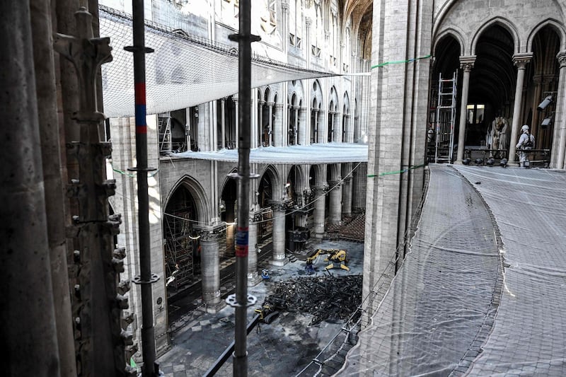 This file photo taken on July 17, 2019 shows damage on the nave and rubble during preliminary work in the Notre-Dame de Paris Cathedral three months after a major fire in Paris. AFP