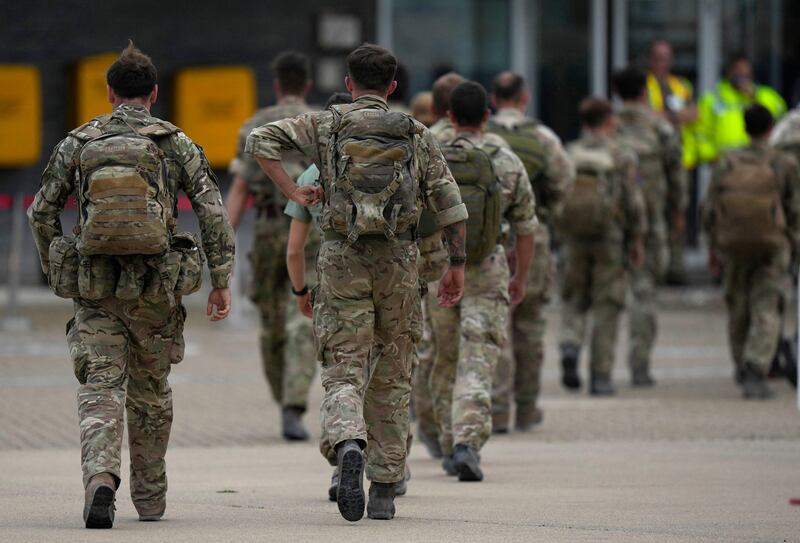 British troops are among those being prepared to cover public services roles during the pre-Christmas strikes. AFP