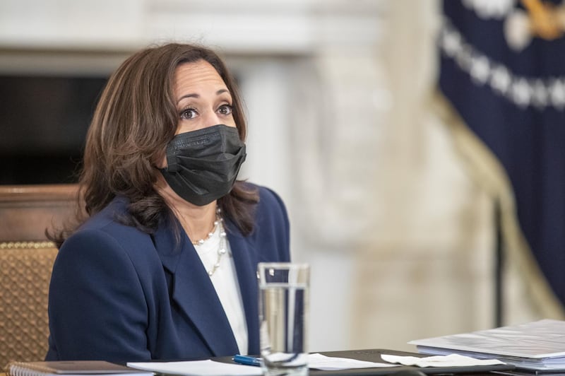 U.S. Vice President Kamala Harris wears a protective mask while speaking during a meeting in the State Dining Room of the White House in Washington, D.C., U.S., on Wednesday, March 24, 2021. Biden is meeting with key cabinet members and immigration advisers as he faces mounting pressure to address the influx of migrants that has overwhelmed shelters at the U.S. southern border. Photographer: Shawn Thew/EPA/Bloomberg