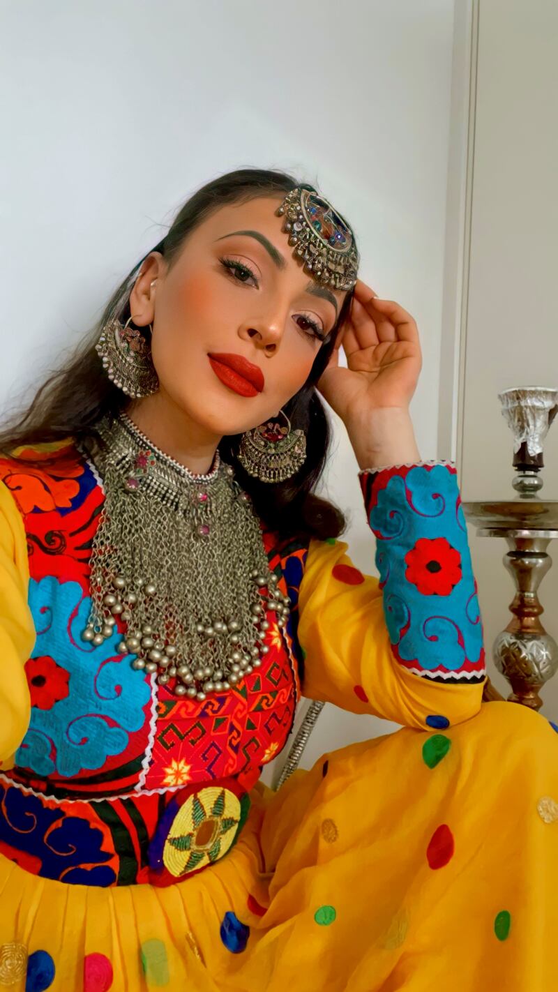 A woman poses in traditional Afghan attire, in Stavanger, Norway, in this picture obtained from social media.  Sophia Moruwat/via Reuters