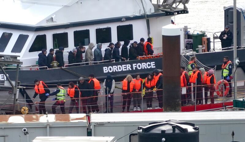 Migrants are taken to Dover, Kent, on a Border Force vessel after being rescued from a small boat on the English Channel on October 23. PA