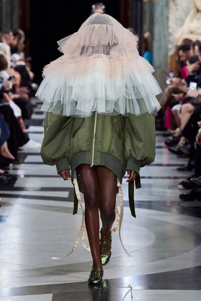 Simone Rocha mixed military elements such as parachute fabrics and aviation jackets, with flowers and veils. Photo: Simone Rocha