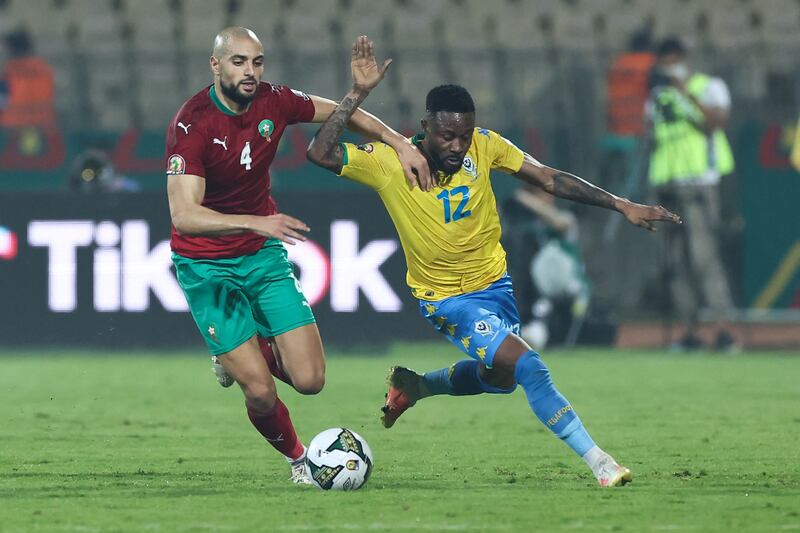Morocco's midfielder Sofyan Amrabat fights for the ball with Gabon's midfielder Guelor Kanga. AFP