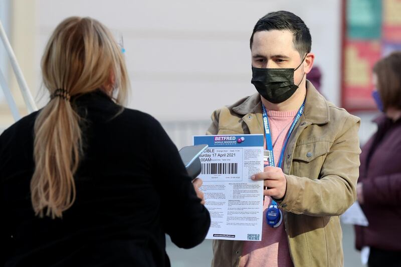 A spectator has their ticket scanned by a member of staff. Getty