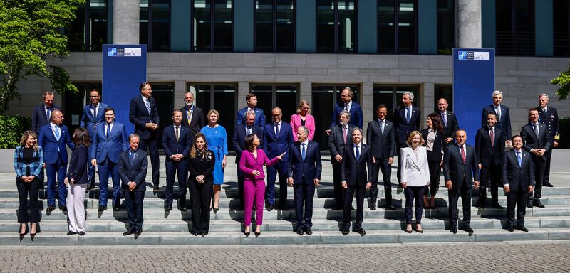 Officials stand together for a photo at an informal meeting of Nato foreign ministers in Berlin, with the focus on the potential  membership of Finland and Sweden. Getty Images