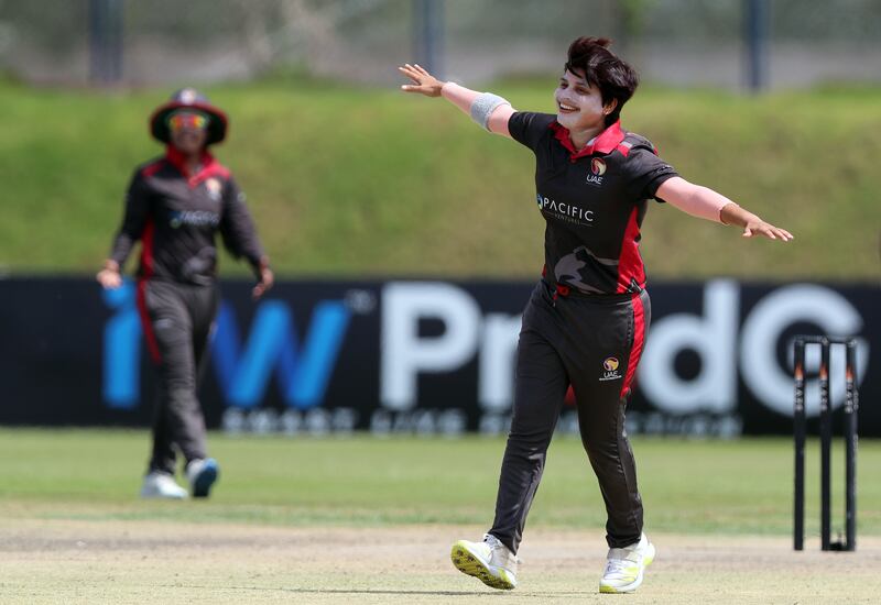 In this April 30, 2022 file photo, UAE's Chaya Mughal celebrates the wicket of Hong Kong's Cindy Ho during a T20 international at the Malek Cricket Ground, Ajman. Chris Whiteoak / The National