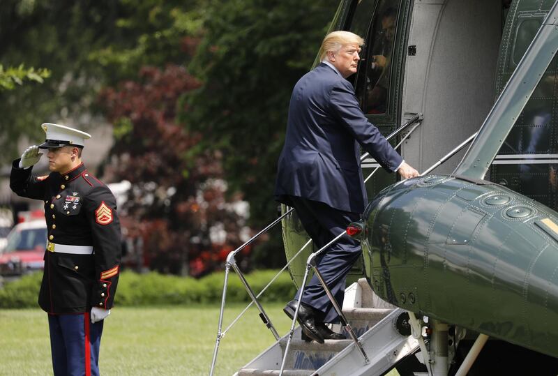 U.S. President Donald Trump boards Marine One before departing to Camp David on the South Lawn of the White House in Washington, D.C., U.S., on Friday, June 1, 2018. Trump said he will meet Kim Jong Un on June 12 in Singapore, after he sat down with a senior adviser to the North Korean leader in the White House to continue the groundwork for the historic meeting. Photographer: Yuri Gripas/Bloomberg