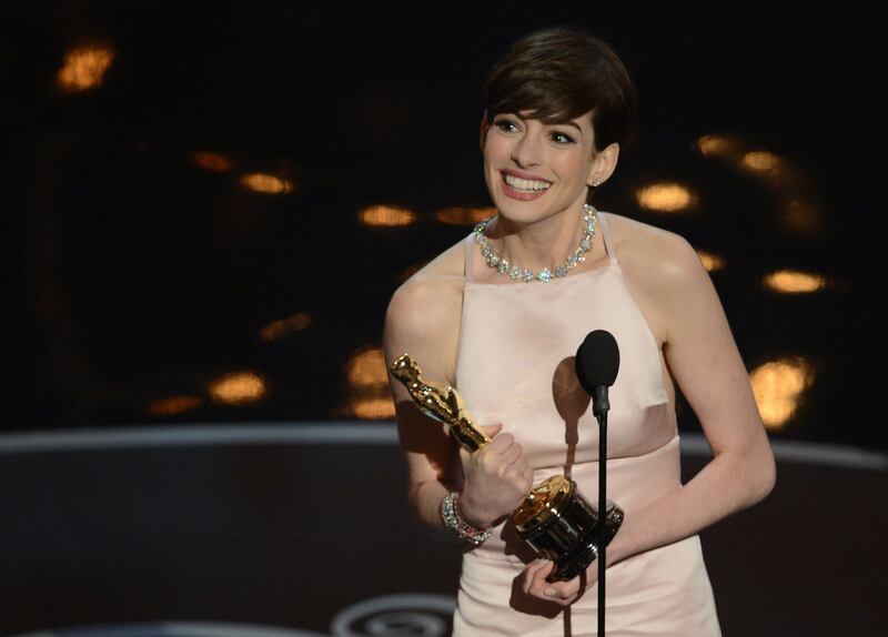 Best Supporting Actress winner Anne Hathaway addresses the audience onstage at the 85th Annual Academy Awards on February 24, 2013 in Hollywood, California. AFP PHOTO/Robyn BECK
 *** Local Caption ***  564753-01-08.jpg