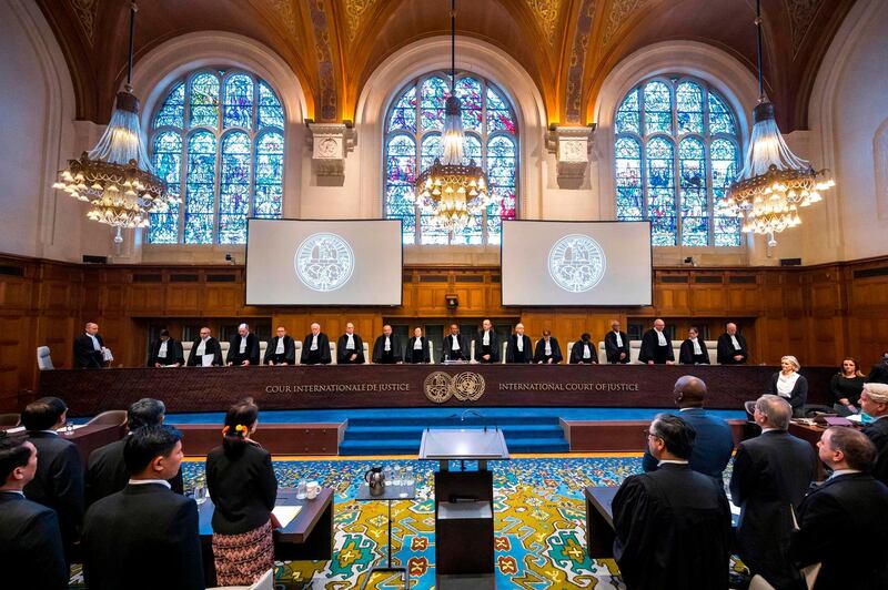 A handout photo released by the International Court of Justice shows a general view of The International Court of Justice (ICJ) holding a public hearing in the case concerning the Application of the Convention on the Prevention and Punishment of the Crime of Genocide (The Gambia v. Myanmar) at the Peace Palace in The Hague, with Myanmar's State Counsellor Aung San Suu Kyi (5thL) and Gambian politician and lawyer Abubacarr Marie Tambadou (4thR) attending.  AFP