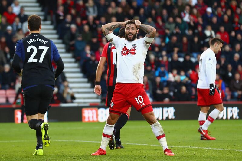 BOURNEMOUTH, ENGLAND - DECEMBER 03: Charlie Austin of Southampton reacts during the Premier League match between AFC Bournemouth and Southampton at Vitality Stadium on December 3, 2017 in Bournemouth, England.  (Photo by Clive Rose/Getty Images)