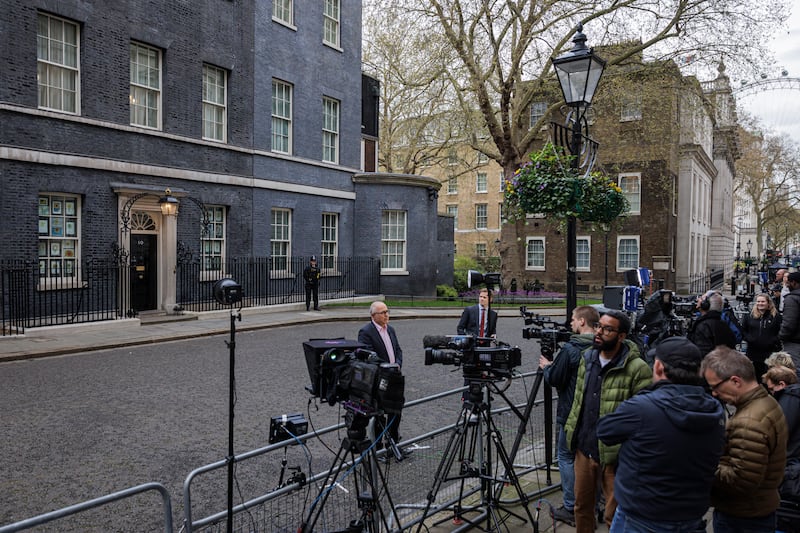 Members of the media gather on Downing Street after police in London issued 50 fines in relation to parties and gatherings held at government buildings during Covid lockdowns. Getty Images