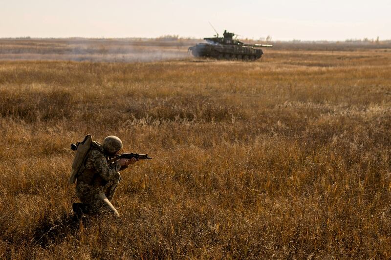 A soldier in the Ukrainian Armed Forces takes part in military drills near the border with Russian-annexed Crimea. Reuters