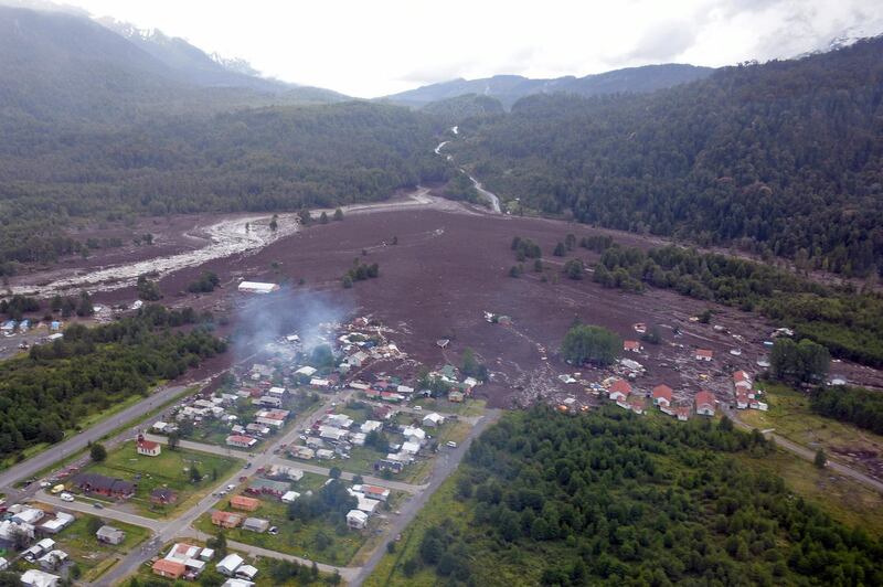 The aftermath of a landslide that caused the death of at least three people, the disappearance of another eight and more than twenty homes destroyed or damaged in the town of Villa Lucia, Chile. Christian Brown / EPA