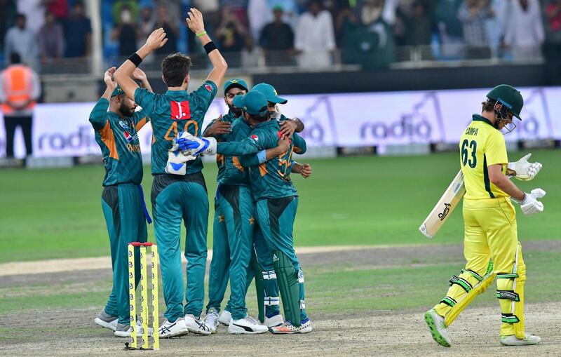 Pakistan cricketers celebrate after victory in the second T20 cricket match between Pakistan and Australia at The International Cricket Stadium in Dubai on October 26, 2018. 
 / AFP / GIUSEPPE CACACE
